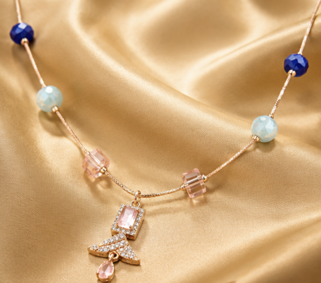 Aurora Collection – Geometric Crystal Pendant Necklace with Blue Bead Accents