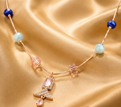 Aurora Collection – Geometric Crystal Pendant Necklace with Blue Bead Accents