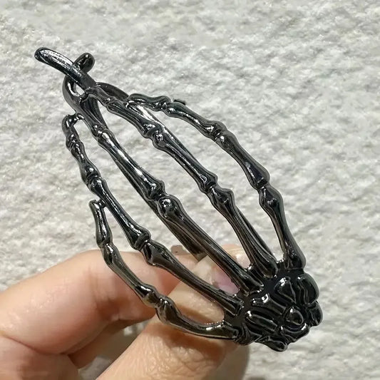 Skull Hand Twist Clip Black 1 pc